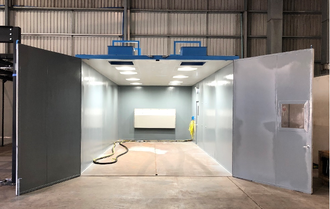 Burwell modular blast room with insulated panel walls, LED lighting and personnel door
